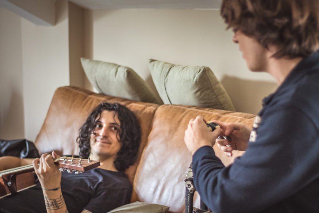 Marco and Eric Marco relaxing in the dressing room